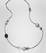 From the Carved Cable Collection. An elegant blend of grey chalcedony, black onyx, howlite, moon quartz, hematite and sterling silver bead stations on a box link chain. Grey chalcedony, black onyx, howlite, moon quartz and hematiteSterling silverLength, about 40Lobster clasp closureImported 