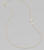 A wispy chain of 14k yellow gold features a cross pendant set askew for a modern edge.14k yellow gold Length, about 16 Pendant length, about ¾ Spring ring clasp Made in USA