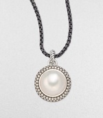 From the Mooonlight Ice Collection. A lustrous white mabe pearl sits center with a dazzling, two-row diamond surround. White mabe pearlDiamonds, 1.36 tcwBlackened sterling silverSize, about ½Imported Please note: Chain sold separately.