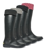 Stomp through puddles in style. Betsey Johnson dolled up these rain boot liners with cute stripes and polka dots.