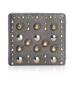 Stay organized with some edge with this studded leather wallet from Juicy Couture. Outfitted with multiple pockets and compartments, it discretely slips inside a satchel or tote for effortless go-everywhere accessorizing,