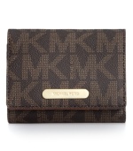 Signature style takes center stage with this monogram wallet from MICHAEL Michael Kors. Rich Saffiano leather is accented with golden hardware, while the pocket-lined interior stashes essentials with ease.