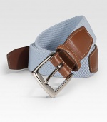 EXCLUSIVELY OURS. We've added a hint of stretch ease to a classic look, lending superior comfort to an all-season style. Kipskin tabs Nickle-plated buckle About 1¼ wide Made in USA 