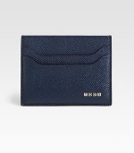 Pebbled Italian leather card case is fashioned with signature logo detail.Six card slots4 x 3Imported