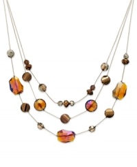 Layer on luxe loveliness with this three-row necklace from Style&co. Bronze and gold glass stones illuminate your look. Crafted in gold tone mixed metal. Approximate length: 18 inches + 2-inch extender.