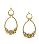 Every girl loves a little glamour. Jessica Simpson's elegant oval-shaped drop earrings light up an evening affair with stylish spacers embellished by round-cut crystals. Crafted in gold tone mixed metal. Approximate drop: 3 inches.