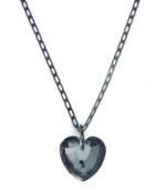 The iconic heart pendant takes on a frosty sheen. BCBGeneration's chic grey glass heart shimmers in a hematite tone mixed metal setting and chain. Approximate length: 26 inches. Approximate drop: 3/4 inch.