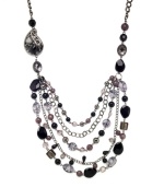 Snap up the hottest new trend in chic animal prints. Style&co. necklace features plastic jet and animal print beads for a style that's wearable and wild. Crafted in mixed metal. Approximate length: 18 inches. Approximate drop: 7 inches.