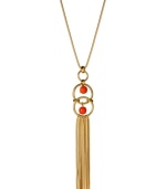 Drop in on the hot tassel trend! Kenneth Cole New York's pendant necklace highlights round coral resin beads in linked ring setting with dangling gold tone chains. Crafted in gold tone mixed metal. Approximate length: 26 inches + 3-inch extender. Approximate drop: 7-1/4 inches.