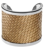 Weave together your perfect ensemble. This Michael Kors cuff bracelet features natural braided leather sitting atop silver tone brass. Approximate diameter: 2-1/4 inches.