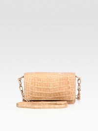 A timelessly chic design in beautiful crocodile, features a removable strap to convert it to a crossbody bag.Removable leather and chain strap, 22½ drop Magnetic flap closure One outside open pocket Two inside zip pockets Two inside open pockets Six credit card slots Leather lining 7½W X 5H X 1½D Imported