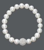 A traditional design receives a sparkling touch. Cultured freshwater pearls (8-9 mm) in shimmery white hues adorn this chic stretch bracelet, while a clear crystal fireball adds extra glamour. Approximate diameter: 3-1/2 inches.