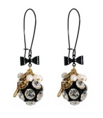 Dare to be dramatic. Bold drop earrings by Betsey Johnson combine sparkling crystal-coated fireballs, mini key and glass stone charms with black ribbon accents. Crafted in gold tone and black-plated mixed metal. Approximate drop: 2-1/2 inches.