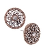 Complete your whole look with a pair of sparkling studs. Perfect for day or night, these 2028 earrings feature a unique, filigree, silver and rose gold tone mixed metal setting with a round-cut crystal center stone. Approximate diameter: 3/4 inch.