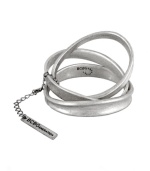 Get on board with the stacking trend this season in this chic bangle set by BCBGeneration. Three asymmetrical bangles create a modern look in oxidized silver tone mixed metal. Approximate diameter: 2-1/2 inches.