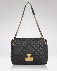 Classic and crave-inducing, Marc Jacob's quilted satchel is a luxe essential for style-setters of any generation.