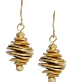 Glittering in gold. Kenneth Cole New York's graduated disc earrings shimmer in a gold tone mixed metal setting. Approximate drop: 1 inch.