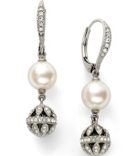 Poise, polish, and the perfect finishing touch. Eliot Danori's subtle drop earrings feature crystal-accented drops and leverback along with simulated pearls (8 mm). Crafted in rhodium-plated mixed metal. Approximate drop: 3/4 inches.