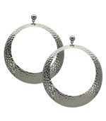 GUESS takes the traditional hoop earring and adds an on-trend twist with a unique textured design. Set in imitation rhodium-plated mixed metal. Approximate drop: 3-1/2 inches. Approximate diameter: 2-1/4 inches.