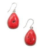 Let smooth, earthy pebbles adorn your earlobes. Bright coral-colored reconstituted calcite stones dangle daintily from a silver tone mixed metal setting and french wire backing. Approximate drop: 1-1/2 inches.