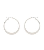 Shimmery hoops with a modern spin. Kenneth Cole New York earrings feature a graduated hoop in silver tone mixed metal. Approximate diameter: 1-1/4 inches.