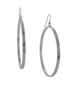 Step it up a notch in bold hoops that match with any ensemble. BCBGeneration's head-turning hoop earrings feature a polished silver tone mixed metal setting. Approximate diameter: 2-1/2 inches.