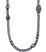 The shape of things to come. Vince Camuto's station necklace takes a trendy turn with unique geometric detailing. Crafted in hematite tone mixed metal, it's embellished with clear crystal accents. Approximate length: 30 inches.