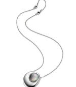 It takes two. The reversible design on Breil's pendant necklace lets you choose between light blue quartz or black mother of pearl--all the better to mix and match with your wardrobe! Set in silver tone stainless steel. Approximate length: 16-1/2 inches + 2-inch extender. Approximate drop: 1-4/10 inches.