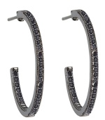 Gray matters. A black platinum finish adds depth and drama to CRISLU's chic hoop earrings. Crafted in sterling silver with an inside out design, they're adorned with glittering black cubic zirconias (1/2 ct. t.w.). Wear them day or night for a gorgeous, glamorous look. Approximate diameter: 15/16 inch.