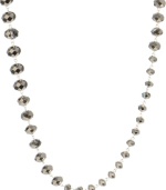 Luminescent layers. Shimmery glass beads with multiple facets glisten in this stylish long strand by Kenneth Cole New York. Set in silver tone mixed metal. Approximate length: 43 inches.