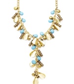 Brighten your look with bold style and a hint of summer color. INC International Concepts' Y-shaped necklace features plastic turquoise beads, oxidized brass tone accents and glass rondelles. Set in mixed metal. Approximate length: 21 inches. Approximate drop: 5 inches.