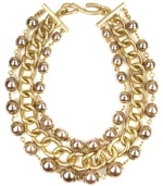 Give in to the drama. AK Anne Klein's dramatic necklace boasts warm hues with plastic pearl beads and heavy linked chains. Set in gold tone mixed metal with a hook closure. Approximate length: 16 inches + 2-inch extender.