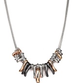 Raise the bar. Nine West's trendy necklace combines graduated bars of silver, rose gold and hematite tone mixed metal on a doubled snake chain. Approximate length: 16 inches + 2-inch extender. Approximate drop length: 3/4 inch. Approximate drop width: 2-3/4 inches.