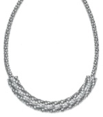 Glam it up! With a touch of crystal and a silver tone mixed metal setting, Alfani's frontal necklace is well-equipped for any special occasion. Approximate length: 18 inches + 2-inch extender.