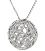 This elaborately crafted, spherical pendant is inspired by delicate flower petals. Sparkling in clear crystal pavé, this Swarovski pendant comes on a rhodium-plated mixed metal chain and lends a modern, sophisticated note to any outfit. Approximate length: 23 inches. Approximate drop: 1-1/4 inches.