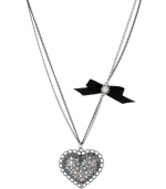 Show your love for all things Betsey! Betsey Johnson's sweet pendant necklace features a silver tone heart pendant with clear and blue-colored crystal accents, plus a black grosgrain ribbon with crystal accent. Crafted in rhodium-plated silver tone mixed metal. Approximate length: 16 inches + 3-inch extender. Approximate drop length: 1-3/4 inches. Approximate drop width: 1-3/5 inches.