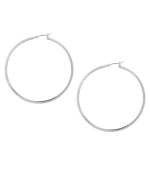 Don't mess with perfection. These traditional hoop earrings from Kenneth Cole New York are crafted in silver tone mixed metal with a click-top closure. Approximate diameter: 2 inches.