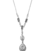 Exude 1950s era elegance in this vintage-inspired classic by Givenchy. Y-shaped pendant features round-cut and rectangular crystals set in silver tone mixed metal. Approximate length: 15 inches.