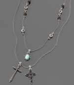 The ultimate in fashion jewelry with ecclesiastical style: this Lucky Brand Jeans necklace features two stylized crosses, wooden and enamel bead and a bright green stone charm. Necklace can be worn doubled. Approximate length: 19 inches with 2-inch extender. Approximate drop: Approximate drop: 1-3/4 inches.