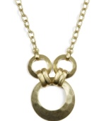 Industrial chic meets rustic charm in this unique triple ring pendant from Jones New York. Hammered texture necklace crafted from gold-plated mixed metal. Approximate length: 18 inches. Approximate drop: 2 inches.