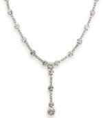 Shine like a star with this crystal-studded necklace by Carolee. Large and small crystals make a dramatic statement with a plunging Y-shaped pendant. Crafted in silver-plated mixed metal. Approximate length: 16 inches + 2-inch extender. Approximate drop: 1-3/4 inches.