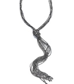 Get wrapped up in sophistication. This lariat-style necklace by Alfani features a unique hematite tone mixed metal necklace with a shot bead design. Approximate length: 24 inches.