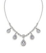 Elegance defined by the finishing touches. Carolee necklace illuminates your neckline with its breathtaking frontal design highlighting five pear-cut glass stones set in silver tone mixed metal. Approximate length: 16 inches + 2-inch extender.