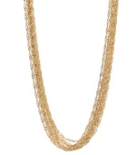 Make a style statement in luxurious layers. Kenneth Cole New York necklace features ten strands of long, gold tone mixed metal chains. Approximate length: 32 inches + 3-inch extender.