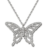 Flight of fancy: Swarovski's butterfly-shaped Nightingale pendant is the perfect whimsical accent. Made in silver tone mixed metal. Approximate length: 15 inches. Approximate drop: 1 inch.