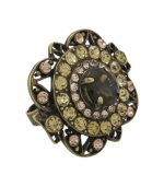 Perfect for the vintage shopper who loves a fabulous find. City by City's antique-themed ring features an intricate geometric pattern adorned with jonquil and chocolate-colored cubic zirconias (6-5/8 ct. t.w.). Crafted in brass tone mixed metal. Sizes 5, 6, 7, 8 and 9.