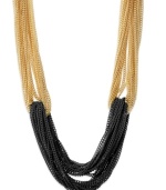 The building block of your style evolution. Gold and black colorblock chains are looped together in this intricate INC International Concepts necklace. Crafted in 14k gold-plated and black tone mixed metal. Approximate length: 16 inches + 3-inch extender.