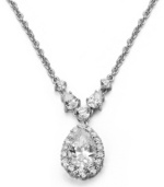 Remarkable style, memorable shine. This CRISLU pendant features round and pear-cut cubic zirconias (5-1/4 ct. t.w.) set in platinum over sterling silver. Approximate length: 16 inches + 2-inch extender. Approximate drop: 1 inch.