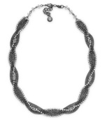 Tie your look together in classic style with a twist. Alfani necklace features braided hematite tone mixed metal accented with sparkling crystals. Approximate length: 17 inches + 2-inch extender.