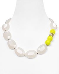 Aqua's beaded necklace emboldens your jewel box with a dose of trend-right neon. Whether with LBDs or staple tees, the chunky strand adds high-octane energy to your look.